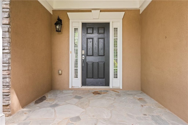 2595 Glaramara Ter, Cumming, GA 30041 - doorway to property with stucco siding and stone siding
