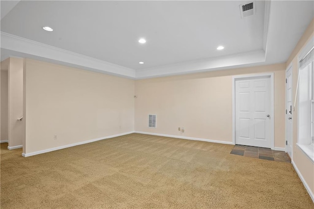 2595 Glaramara Ter, Cumming, GA 30041 - spare room featuring carpet floors, a raised ceiling, recessed lighting, crown molding, and baseboards