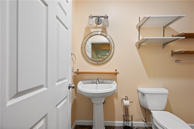 2595 Glaramara Ter, Cumming, GA 30041 - bathroom featuring toilet and baseboards
