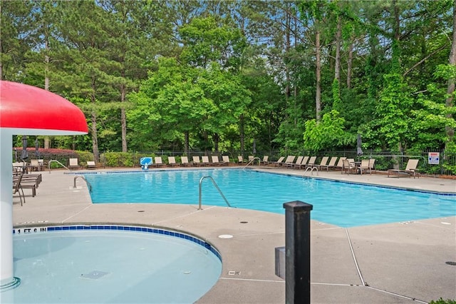 2595 Glaramara Ter, Cumming, GA 30041 - community pool featuring fence, view of scattered trees, and a patio