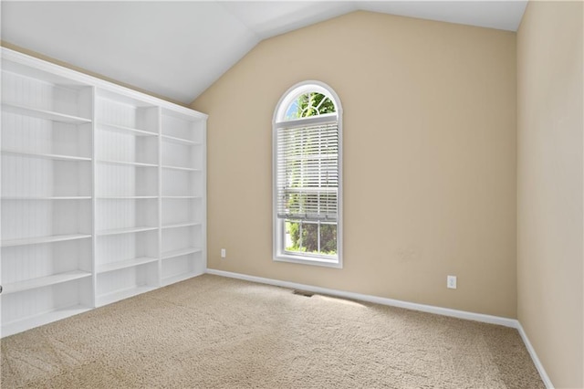 2595 Glaramara Ter, Cumming, GA 30041 - carpeted empty room featuring lofted ceiling and baseboards