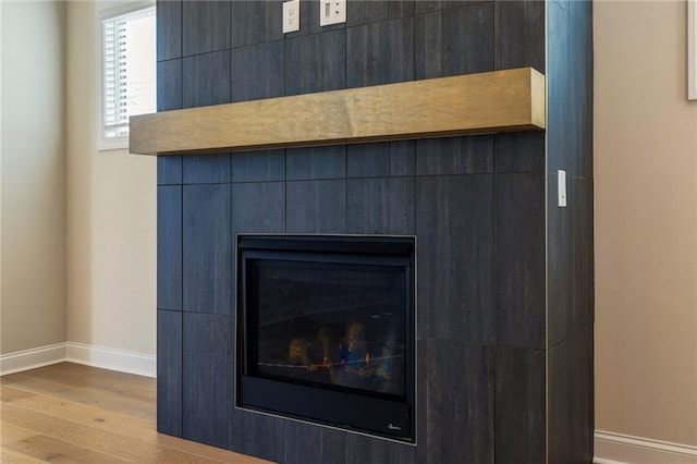 interior details with hardwood / wood-style flooring