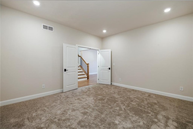 unfurnished bedroom with carpet floors