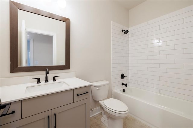 full bathroom with toilet, tiled shower / bath combo, tile patterned floors, and vanity