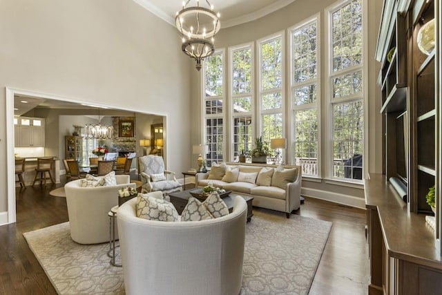 sunroom / solarium featuring an inviting chandelier and french doors
