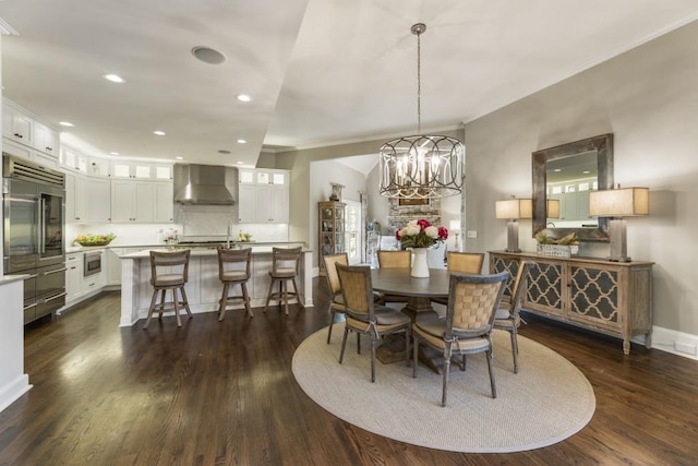 dining room with dark wood-style floors, baseboards, recessed lighting, a chandelier, and crown molding