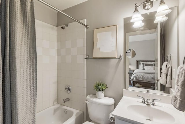 ensuite bathroom featuring shower / bath combo with shower curtain, toilet, vanity, and connected bathroom