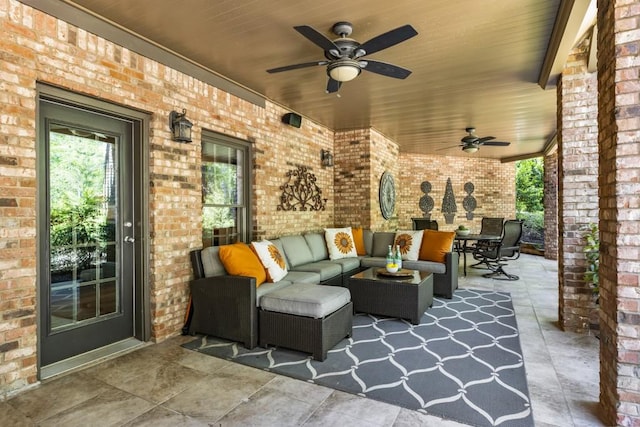 view of patio / terrace featuring outdoor dining area, outdoor lounge area, and ceiling fan