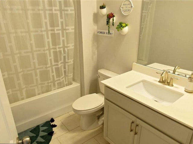 full bathroom featuring tile patterned floors, vanity, toilet, and shower / tub combo