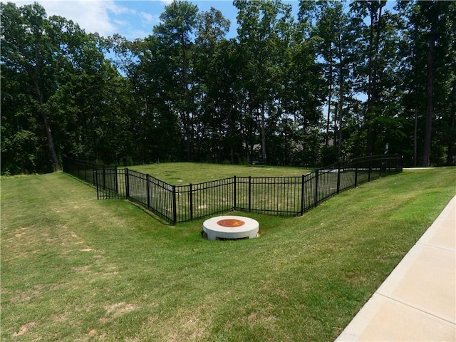 view of yard with an outdoor fire pit