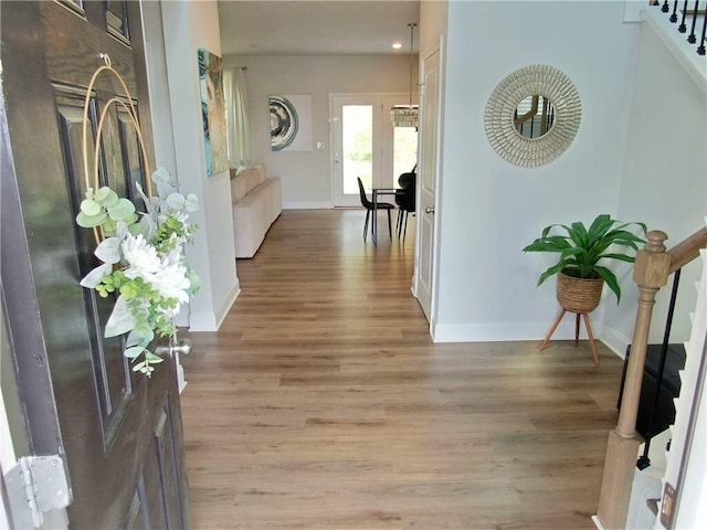 corridor featuring light hardwood / wood-style flooring