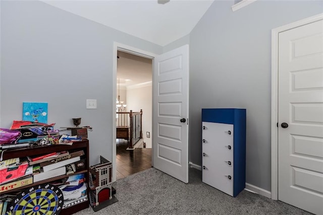 misc room with wood-type flooring and ornamental molding