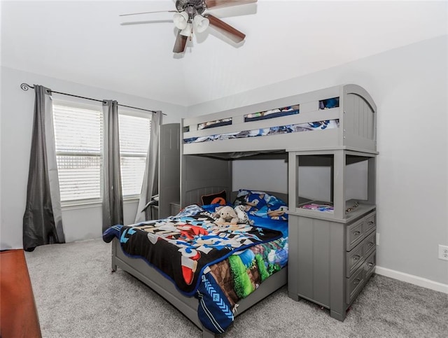 bedroom featuring ceiling fan and light carpet