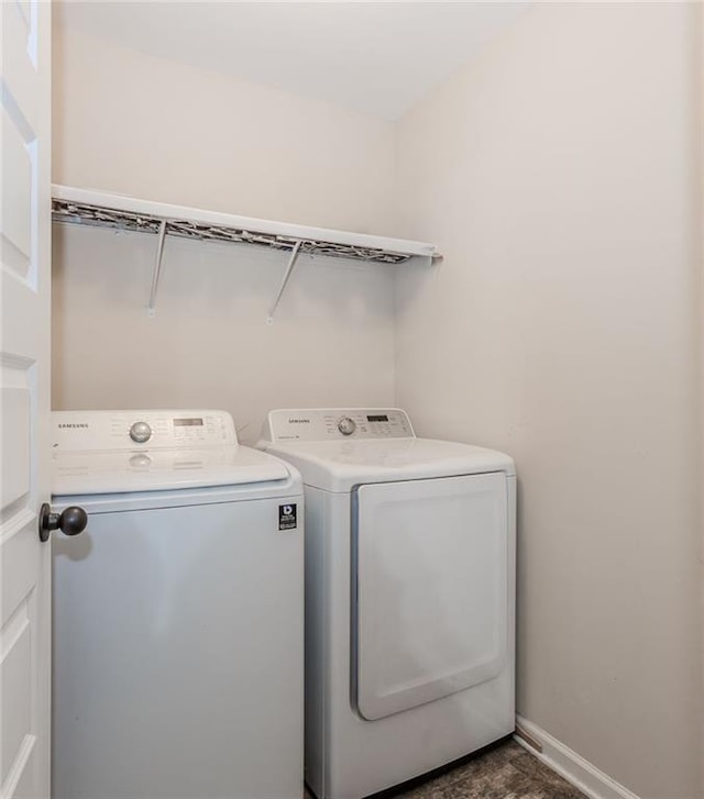 laundry room featuring independent washer and dryer