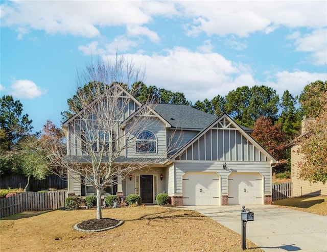 view of front of house featuring a garage and a front yard