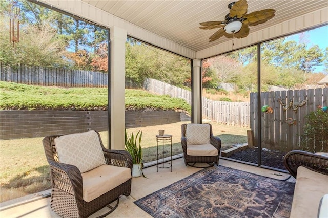 sunroom / solarium with ceiling fan