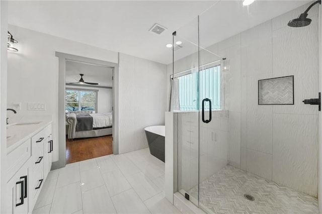 spacious closet featuring hardwood / wood-style flooring