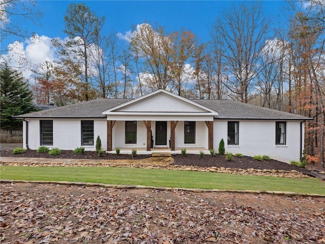 view of front of property with a front lawn and a porch