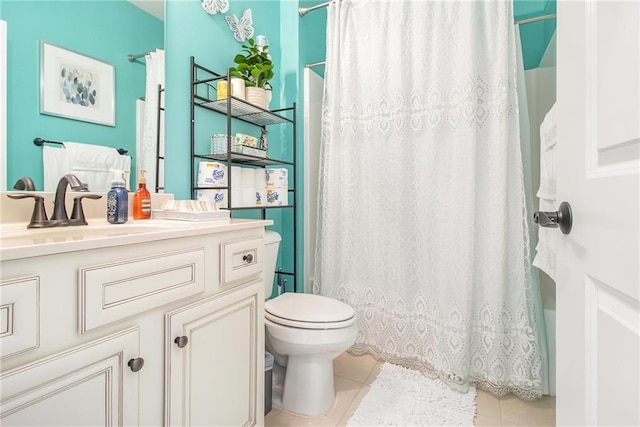 full bathroom with toilet, vanity, tile patterned floors, and shower / bath combo with shower curtain