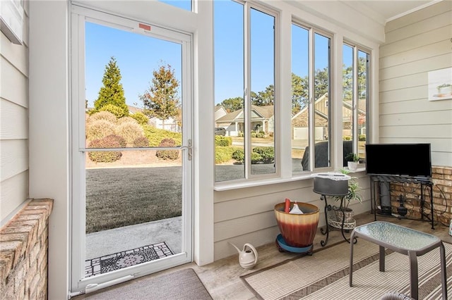 sunroom / solarium with a healthy amount of sunlight