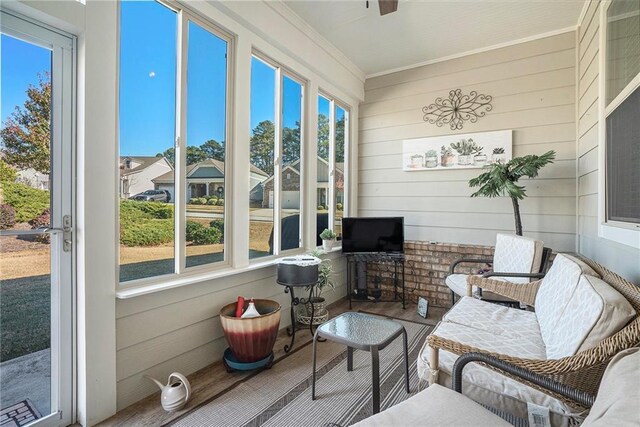 sunroom / solarium featuring plenty of natural light