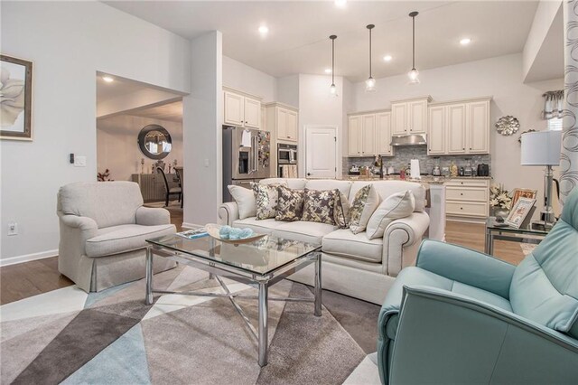 living room with light hardwood / wood-style floors