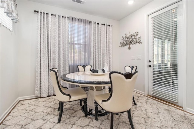 dining area featuring a wealth of natural light