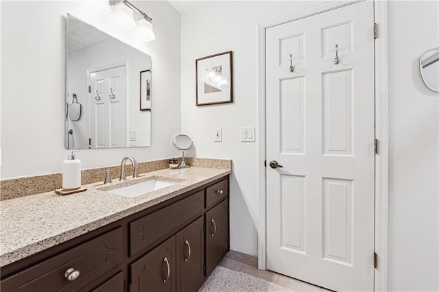 bathroom featuring vanity and tile patterned floors