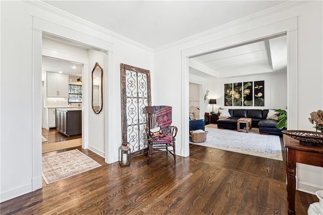 interior space featuring crown molding and dark wood-type flooring