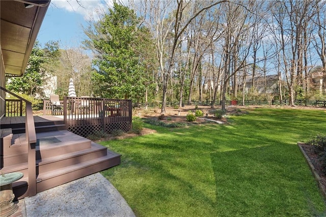 view of yard with a deck