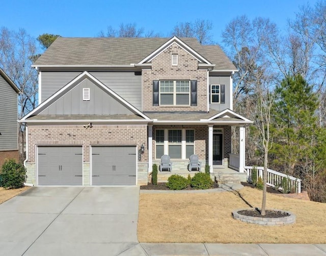 craftsman-style home with a garage and covered porch