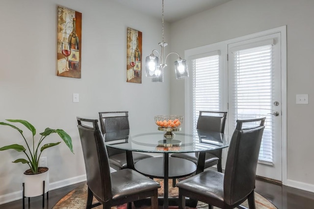 dining space featuring a chandelier