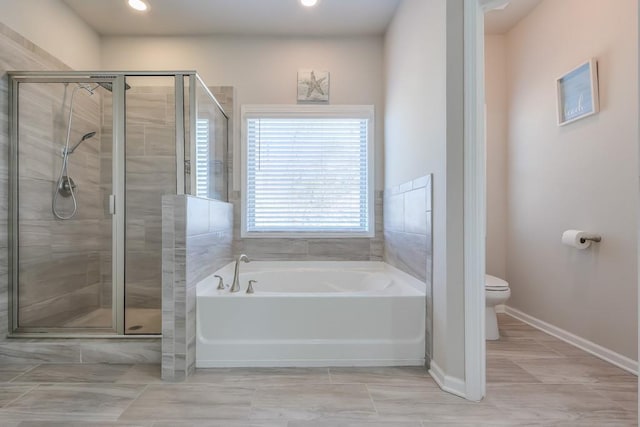 bathroom with plus walk in shower and toilet