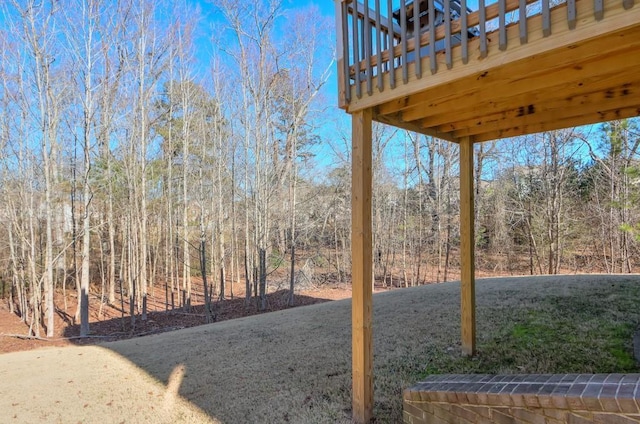 view of yard with a balcony