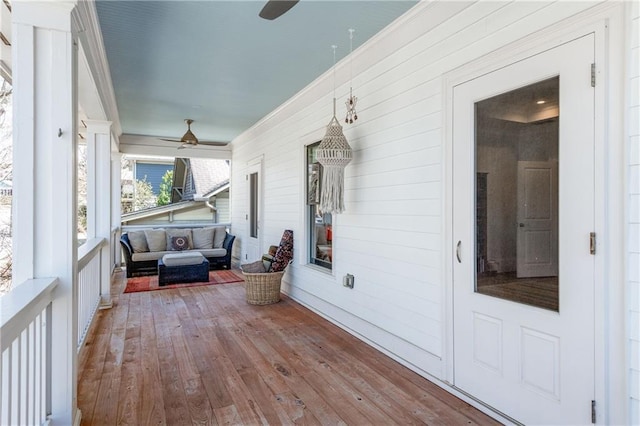 interior space featuring a porch and a ceiling fan