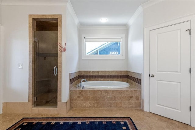 full bathroom featuring a garden tub, a stall shower, crown molding, and tile patterned flooring