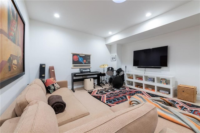 living area featuring recessed lighting and carpet