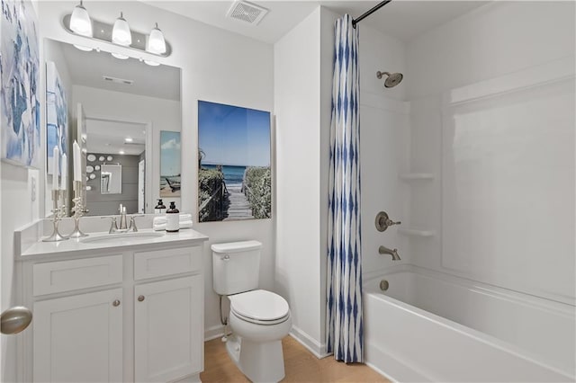 full bathroom with toilet, vanity, wood-type flooring, and shower / bath combination with curtain