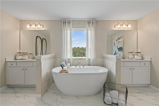 bathroom with a bathtub and vanity