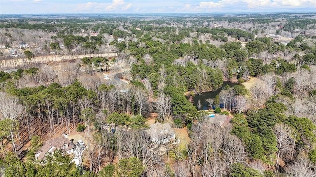 bird's eye view featuring a view of trees