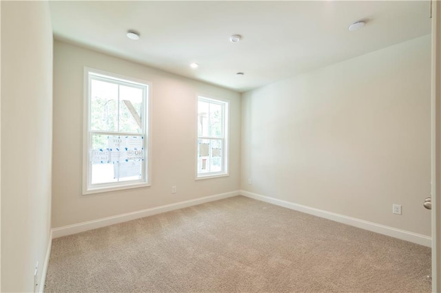 view of carpeted spare room