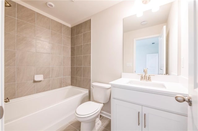 full bathroom featuring vanity, toilet, and tiled shower / bath combo