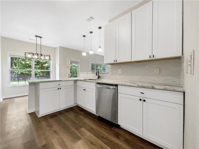 617 Kyles Cir, Hiram, GA 30141 - kitchen with stainless steel dishwasher, a peninsula, a sink, dark wood-style floors, and white cabinets