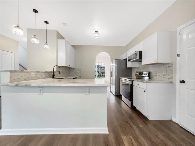 617 Kyles Cir, Hiram, GA 30141 - unfurnished dining area with dark wood-type flooring and baseboards