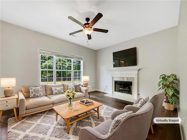 617 Kyles Cir, Hiram, GA 30141 - living room with arched walkways, crown molding, wood finished floors, a wainscoted wall, and a decorative wall