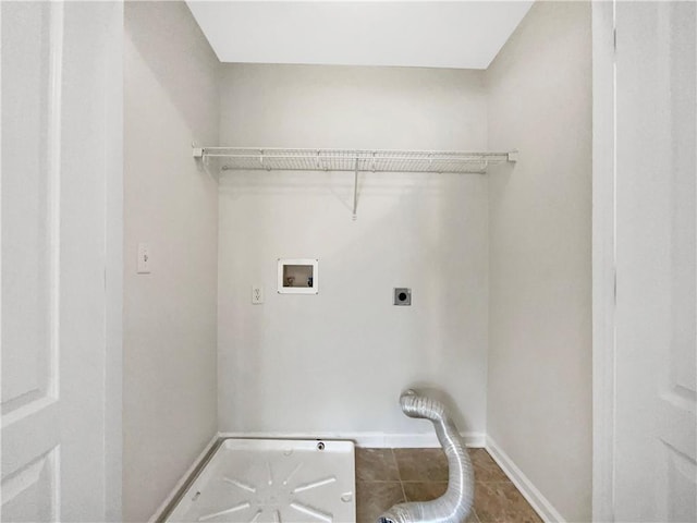 617 Kyles Cir, Hiram, GA 30141 - laundry area with electric dryer hookup, baseboards, hookup for a washing machine, and tile patterned floors