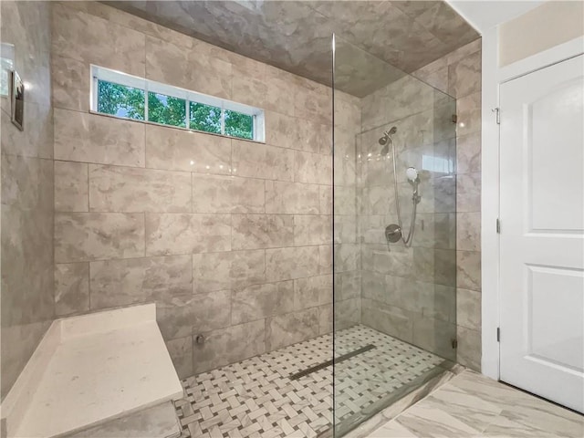 617 Kyles Cir, Hiram, GA 30141 - full bathroom featuring a tile shower and marble look tile flooring