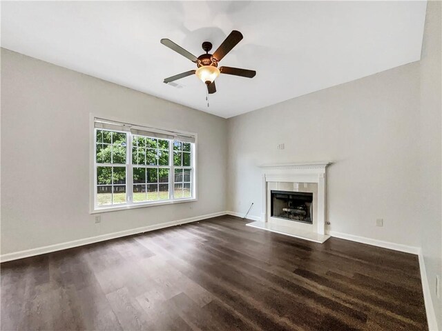 617 Kyles Cir, Hiram, GA 30141 - unfurnished dining area with arched walkways, crown molding, dark wood finished floors, and wainscoting