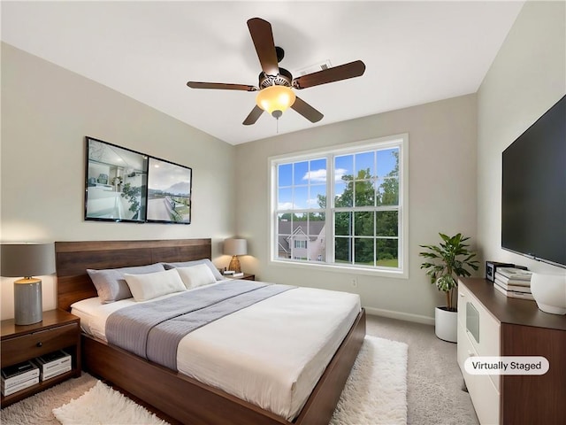 617 Kyles Cir, Hiram, GA 30141 - bedroom with light carpet, baseboards, and a ceiling fan