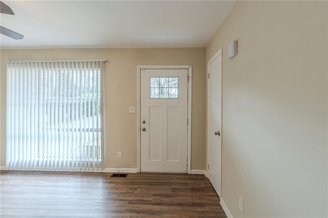 foyer entrance featuring ceiling fan and dark hardwood / wood-style flooring